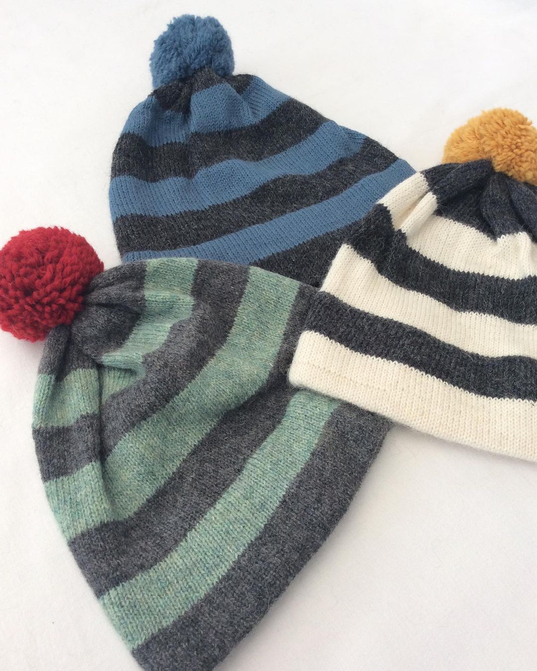 Winter 25/26 collection. Striped bobble hat