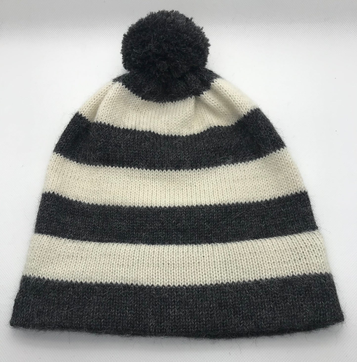 Winter 25/26 collection. Striped bobble hat